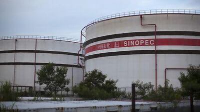 Sinopec is poised to benefit after industrial production and retail sales in China, the world's second-biggest oil consumer, expanded at their fastest pace since March. Jerome Favre / Bloomberg News