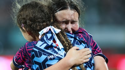 Dubai Warriors celebrate after defeating Dubai College during the Gulf Under-19 Girls final at the Emirates Dubai Sevens. Victor Besa / The National