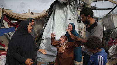 Palestinians whose tents were destroyed by Israeli bombs in a camp west of Rafah. Israel has been warned that ‘human catastrophe’ can no longer be blamed on military mistakes. AP