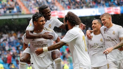 Real Madrid's Casemiro celebrates with teammates. AP Photo