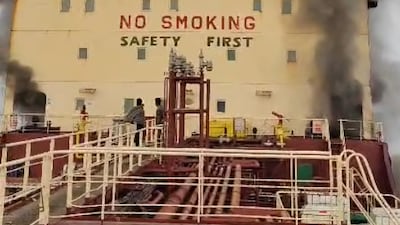 Smoke billows from the tanker Skylight, minutes after it was hit by an Iranian drone early on March 1. Photo: Singh family