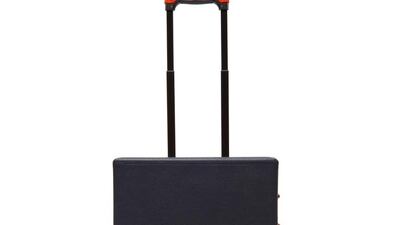 Grace Trolley in navy and red. Courtesy Mark Cross