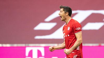 Robert Lewandowski celebrates his opening goal. AP