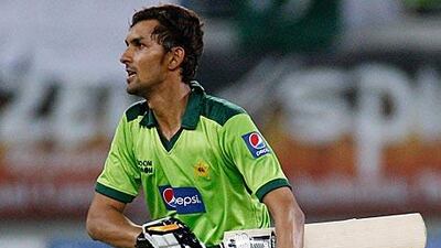 The Pakistani cricketer Zulqarnain Haider celebrates after scoring the winning runs in a match against South Africa at the Dubai Cricket Stadium on Friday. Match-fixers are believed to have demanded a South African win and Zulqarnain has fled the team camp after receiving death threats.