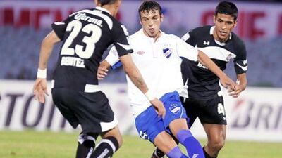 Gonzalo Bueno, centre, the Nacional striker, is one of Baniyas' transfer targets. Ivan Franco / EPA