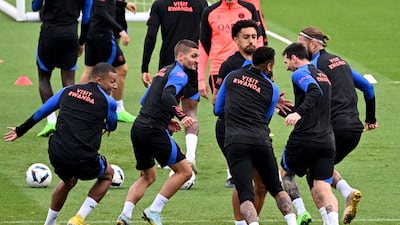 From left: Paris Saint-Germain's Kylian Mbappe, Marco Verratti, Marquinhos, Neymar, Lionel Messi and Sergio Ramos take part in a training session at Camp des Loges. AFP