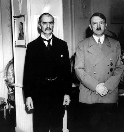 Neville Chamberlain and Adolf Hitler at the Rheinhotel Dreesen, Bonn, 1938. Ullstein bild via Getty Images