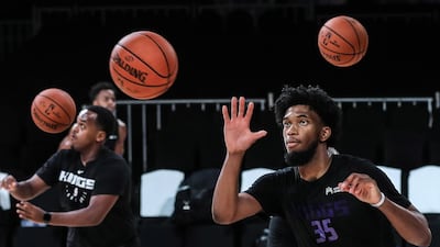 Sacramento Kings player Marvin Bagley, right, during a training session at NSCI dome in Mumba on Thursday, October 3. EPA