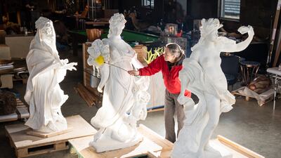 A rare set of four carved marble figures representing the four seasons from La Granja Vella de Marti Codolar in Barcelona, Spain, on display at Summers Place Auctions, in Billingshurst, West Sussex, on Tuesday. Made in France in the late 17th or early 18th century, the life-size figures were going up for sale with an estimate of £120,000-£180,000. PA