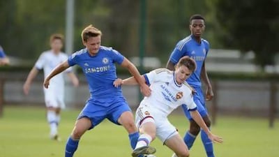 Under 19 players from Chelsea, in blue, and CSKA Moscow compete in a NextGen series games. AP Images