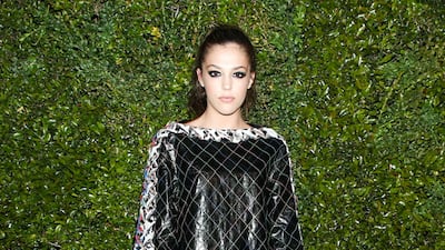 Sylvester Stallone’s daughter, the American model Sistine Stallone wore a black leather quilted and embroidered top from Chanel’s spring/summer 2017 ready-to-wear collection, with a Chanel bag and shoes, and the Entrelacs d’Étoiles diamond ring and Comète Spirale diamond earcuff from Chanel Fine Jewelry. Courtesy Chanel