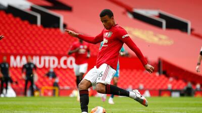 Manchester United's Mason Greenwood scores his team's first goal. AP