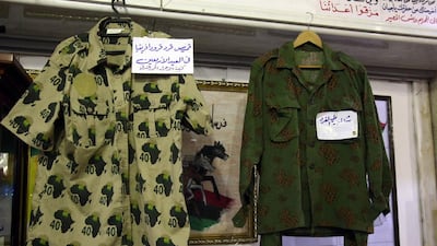 Two shirts once belonging to Muammar Qaddafi are on display in Misurata’s War Museum. AFP Photo/Mahmud Turkia