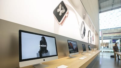 Mac computers on display at the Apple Store in Yas Island. Mona Al Marzooqi / The National