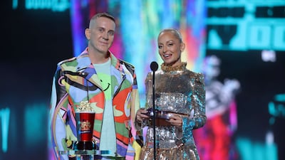 Jeremy Scott and Nicole Richie present onstage. Getty Images / AFP