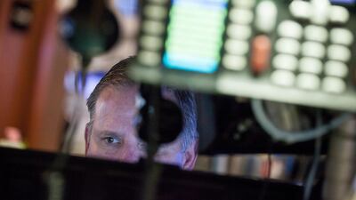 A trader works on the floor of the New York Stock Exchange. Experts think a bear market is unlikely. Michael Nagle/Bloomberg
