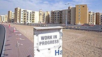 Dubai has a number of laws to protect property investors' rights, but exercising them can be a costly process. Jeff Topping / The National