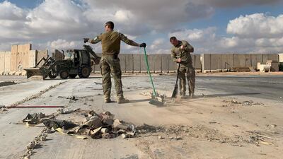 US soldiers clearing rubble at Ain Al Asad military airbase in the western Iraqi province of Anbar. AFP
