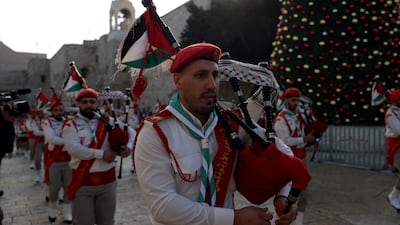 Christian scout teams take part in a procession at Manger Square, leading to the Church of the Nativity in Bethlehem, the occupied West Bank, in the run-up to Orthodox Christmas. EPA