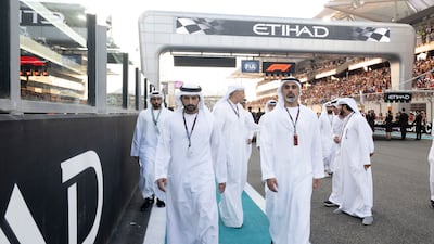 Sheikh Khaled and Sheikh Hamdan bin Mohammed at the race. Mohamed Al Hammadi / Presidential Court