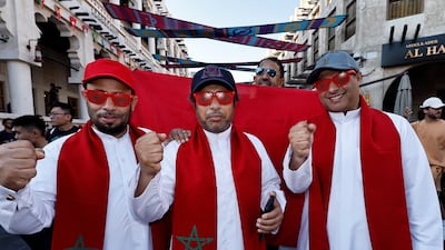 Morocco fans pose in Souq Waqif. Reuters