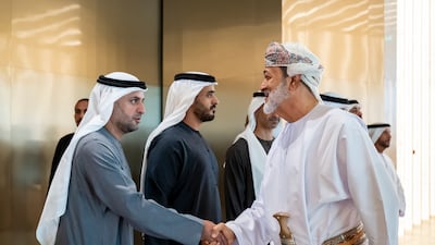 Sheikh Mohamed bin Hamad bin Tahnoon greets Sultan Haitham. Abdulla Al Neyadi / UAE Presidential Court