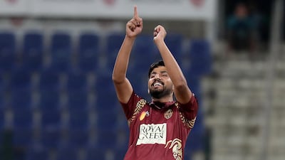 Junaid Siddique of Northern Warriors celebrating after taking the wicket of Bangla Tigers batsman Colin Ingram. Pawan Singh / The National