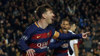 Barcelona’s Lionel Messi celebrates his first goal against AS Roma on Tuesday night in their Champions League contest. Albert Gea / Reuters