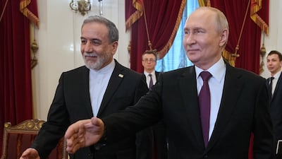 Russian President Vladimir Putin, right, met Iranian Foreign Minister Abbas Araghchi in St Petersburg. EPA