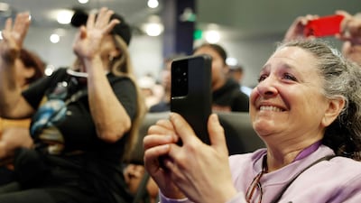 People celebrate during a live broadcast in Downey, California. AFP