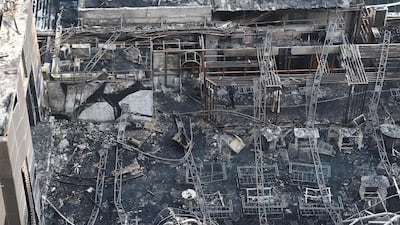 An aerial view of the building's roof after the fire was extinguished. Indranil Mukherjee / AFP