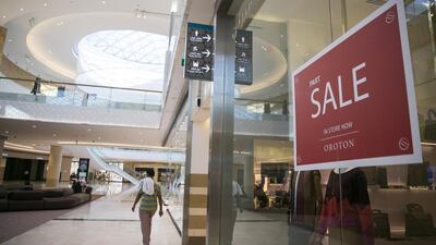 A toilet sign points to a restroom inside the Yas Mall. Some customers are unhappy with the facilities. Silvia Razgova / The National