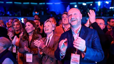 Mr Milanovic's supporters after unofficial results of the first round of Croatia's presidential election. Reuters