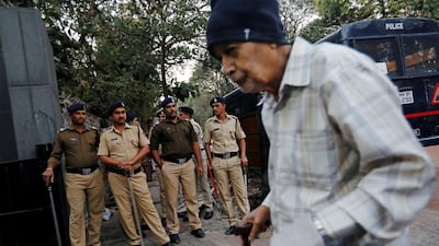Policemen stand guard as a cinema goer arrives to watch Bollywood movie 'Padmaavat' at a theatre in Mumbai, India on January 24, 2018. Danish Siddiqui / Reuters