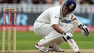 Sachin Tendulkar takes evasive action to an England bouncer during his innings at Edgbaston yesterday.