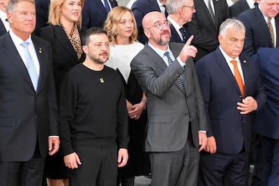 Italy's Prime Minister Giorgia Meloni with other leaders greeting Ukraine's president Volodymyr Zelenskyy at the EU summit in Brussels.