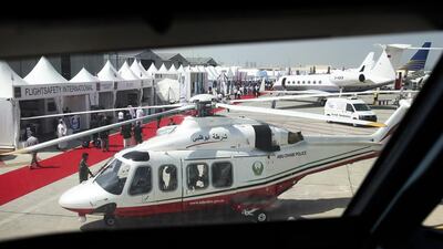 An Abu Dhabi Police helicopter as seen through a cockpit of a plane at the Abu Dhabi Air Expo. Lee Hoagland / The National