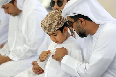 Abdulla Al Nuaimi, 8, remembers his father Nawaf, a pilot who was killed during a training mission in 2015. Chris Whiteoak / The National