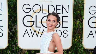 Alicia Vikander, wearing Louis Vuitton, arrives for the 73rd Annual Golden Globe Awards at the Beverly Hilton Hotel in Beverly Hills, California on January 10, 2016. EPABUCK
