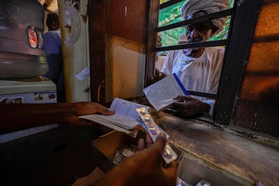 A Sudanese man receiving free medicine provided by volunteers at Omdurman's Al Nao Educational Hospital. AFP