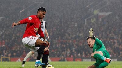 Manchester United's Marcus Rashford takes on Newcastle United's Martin Dubravka. Reuters