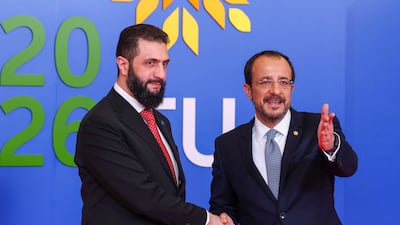 Nikos Christodoulides, the President of Cyprus, welcomes Syria's President Ahmad Al Shara. AFP