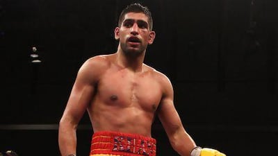 British boxer Amir Khan Amir, who is of Pakistani descent, has built an impressive 28-3 record at the light-welterweight level since turning professional in 2005 and his next bout may be held in Dubai. Al Bello / Getty Images