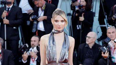 Danielle Marcan in a silver lamé, halter-neck dress at the festival