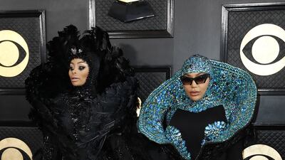 Blac Chyna, left, walks the red carpet with Cameroonian singer and fashion designer Dencia, both wearing custom bejewelled looks. EPA