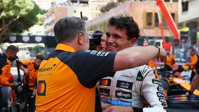McLaren's Lando Norris celebrates with chief executive Zak Brown after winning the Monaco Grand Prix. Reuters