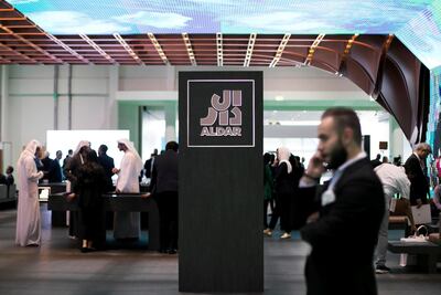 Rush of buyers at Aldar stand -- people have flocked to Cityscape on day three of the event looking for their future homes, following news of changes in property laws. Reem Mohammed / The National