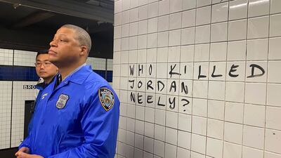 Police officers watch as protesters gather in the Broadway-Lafayette subway station to protest against the death of Jordan Neely in New York. AP