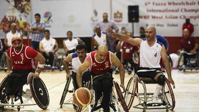 The UAE's men's wheelchair basketball team in action against Jordan at Al Ahli Sports Club in Dubai. Lee Hoagland / The National