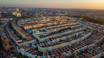 The sun rises over colourful houses in Totterdown, Bristol. Getty Images